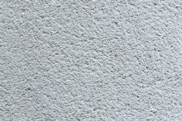 Painted gray textural wall. Close up