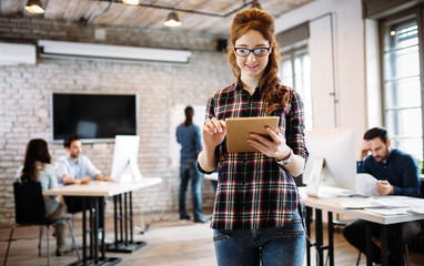 Young attractive architect working in modern office