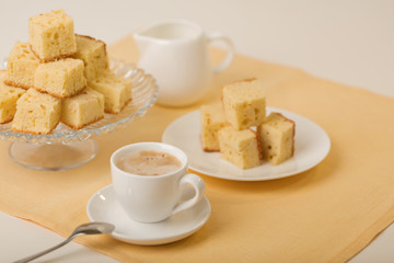Homecooking banoffee with coffee. Banana biscuits squares.