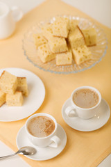 Homecooking banoffee with coffee. Banana biscuits squares.