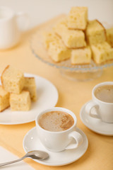 Homecooking banoffee with coffee. Banana biscuits squares.