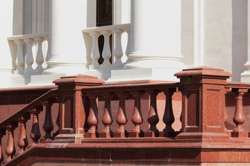 Granite balustrades / railing made of red granite. Architectural elements.