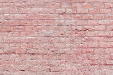 Brick wall painted in red color. Background