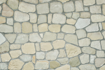 Wall of natural gray stone. Close up