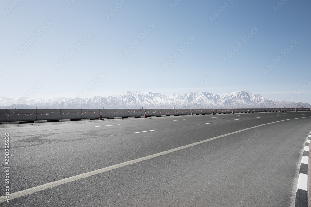 Wall mural empty asphalt road with landscape