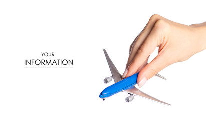 Miniature airplane in hand travel pattern on white background isolation