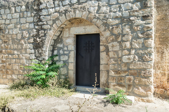Side door in the functioning church of the Christian Maronites in the abandoned village Kafr Birim in the north of Israel