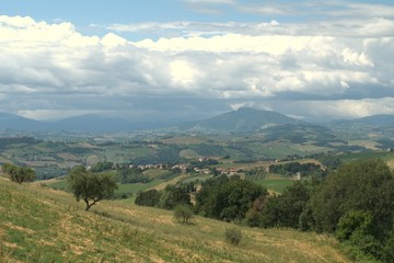 Fototapeta na wymiar Italy,Sibillini mountains,hills,landscape,countryside,panorama,clouds,