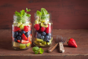 fruit salad in mason jar strawberry blueberry kiwi apple mint