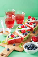 watermelon pizza slices with yogurt and berries, summer dessert
