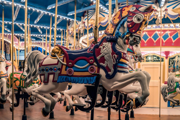 Fototapeta na wymiar Merry go round Carousel vintage horse close up