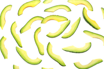 Pieces of ripe avocado on white background