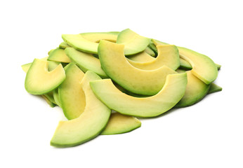 Pieces of ripe avocado on white background