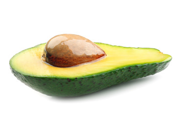 Half of ripe avocado with oil on white background