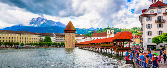 City center with famous Chapel Bridge and lake in Lucerne, Switzerland