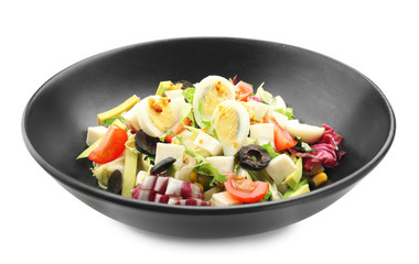 Plate of tasty salad with ripe avocado on white background
