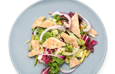 Plate of tasty salad with ripe avocado on white background, closeup