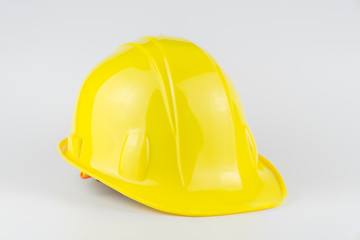 Yellow safety helmet on the white background