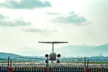 Fototapeta na wymiar Airplane flying in the sky, 2018 June 10 ,Taiwan, Taipei, Songshan Airport