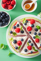 watermelon pizza slices with yogurt and berries, summer dessert