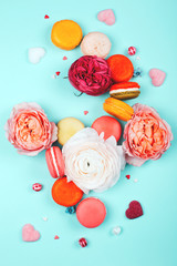 Composition of macarons and flowers