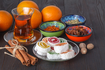 Tea in traditional armudu glass with sweets