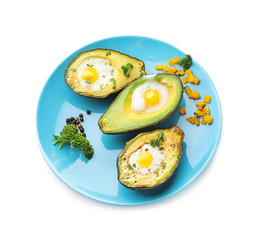 Baked avocados with eggs on white background