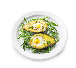 Baked avocado with eggs on white background