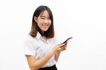 Smiling happy and cheerful Asian female formal dress holding a smart mobile phone  isolated over white background.