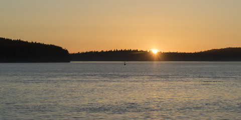 Sunrise over the ocean, Tonquin Beach, Tofino, Vancouver Island, British Columbia, Canada