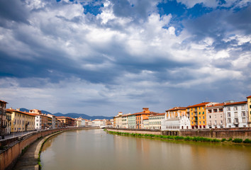 Pisa cityscape with Arno River embankment and Santa Maria della Spina church Tuscany Italy