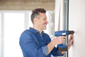Handyman working with drill