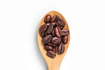 Fototapeta premium Top view of coffee bean on wooden spoon isolated on a white background.