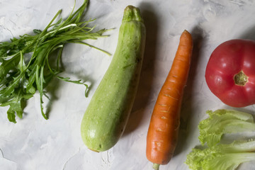 Group of vegetables on a cuisine table. Ingredients for cooking salad.