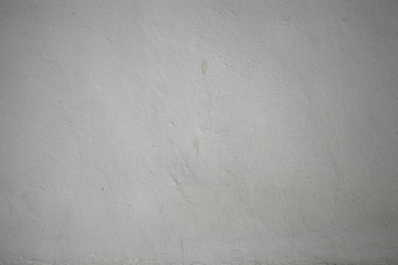 Uneven texture of white clay coated wall