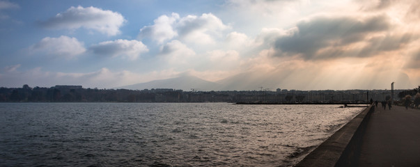 Lake Geneva with Clouds and Sun Panorama