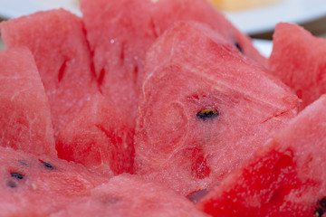 close up of sliced of watermelon on plate
