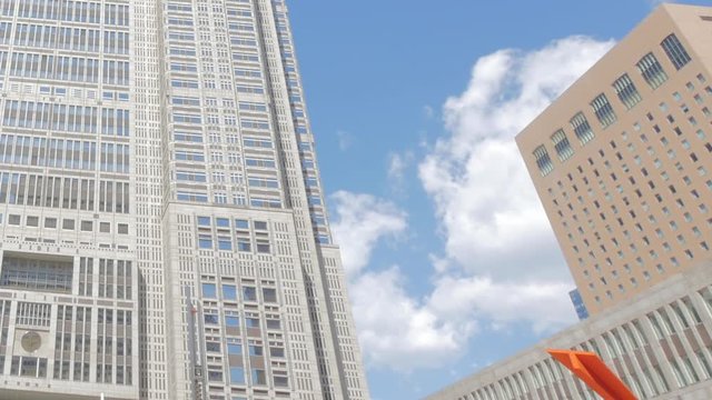 Clouds moving between buildings
