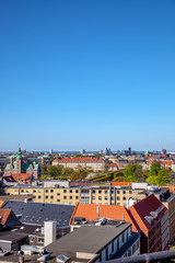 Naklejka premium beautiful cityscape with old and modern buildings at sunny day in copenhagen, denmark