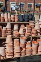 Obraz premium various handmade ceramic pots on shelves in copenhagen, denmark