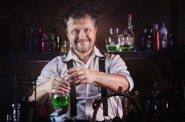 medieval scientist reading book in his laboratory