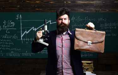 Tutor or teacher. Mature tutor. Good teachers help students ask great questions. Teachers reputation is gold. Professor and school student at the classroom in a school. Conference training