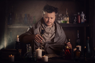 alchemist at the table