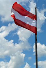 Austrian flag in sunny sky