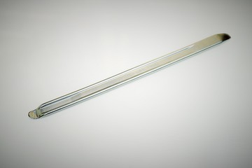 New tire mounting bar on white background