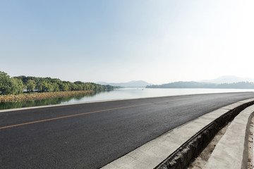 empty asphalt road with landscape