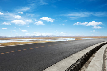 empty asphalt road with landscape