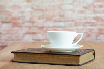 white coffee cup for refreshment on wood table.