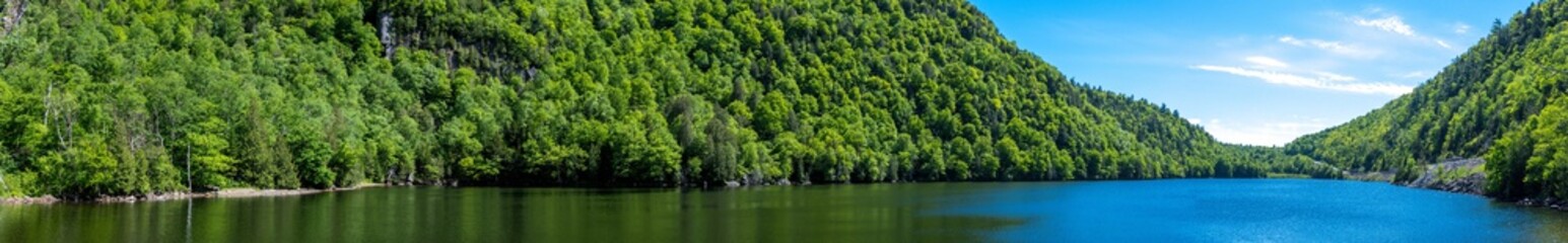 Panoramic view of a lake in the Adirondacks Mountains