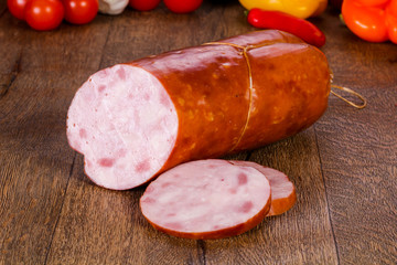 Pork sausages over wooden